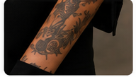 Visible Tattoos - avoid